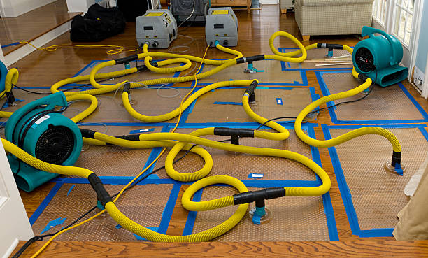 Professional Storm Water Damage Restoration technician working in Chepachet, RI